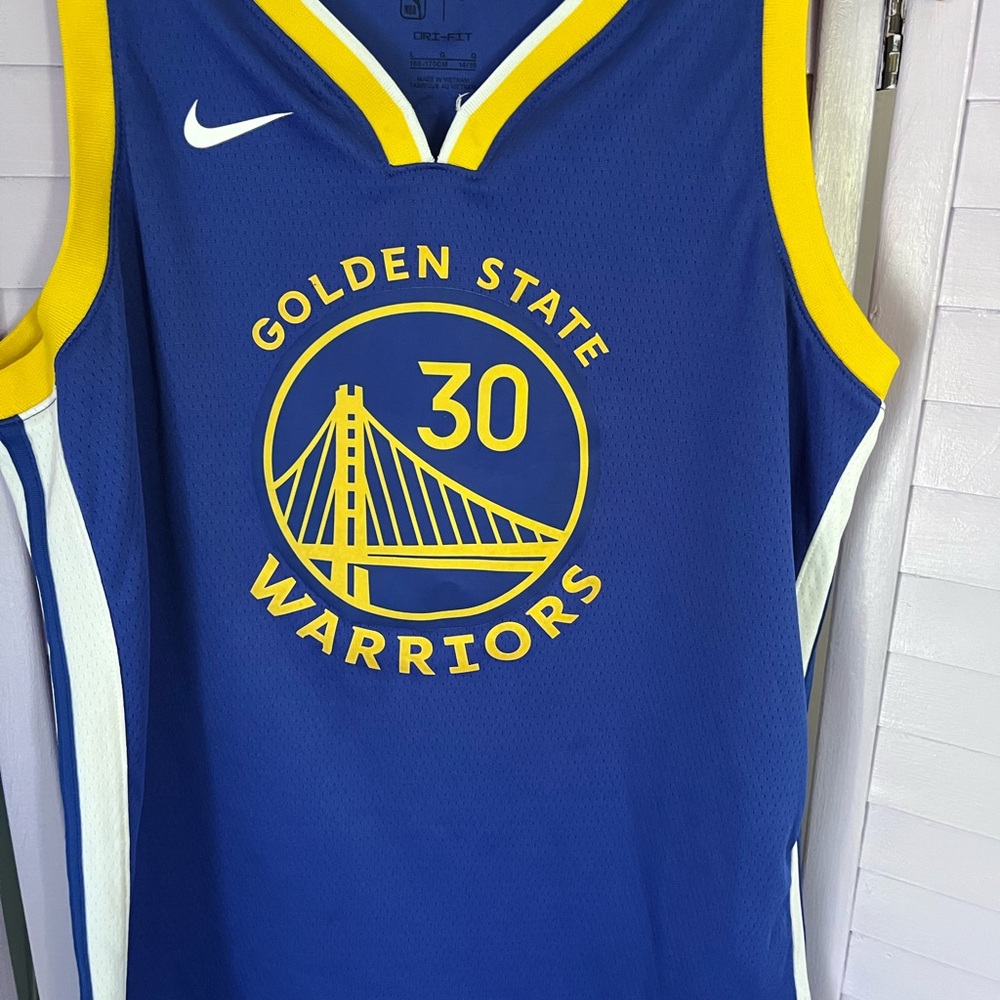 NBA Golden State Warriors Blue and Yellow Jersey.  CURRY.  Older boys size L